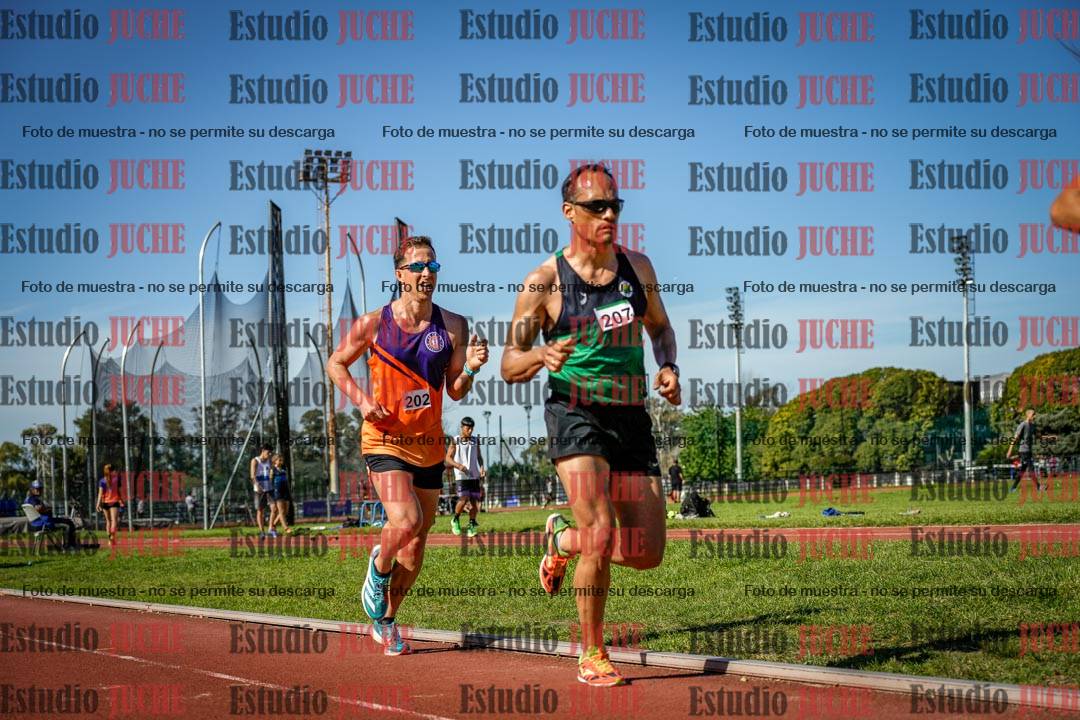 Fotos de los 5000 m llanos de mujeres y varones