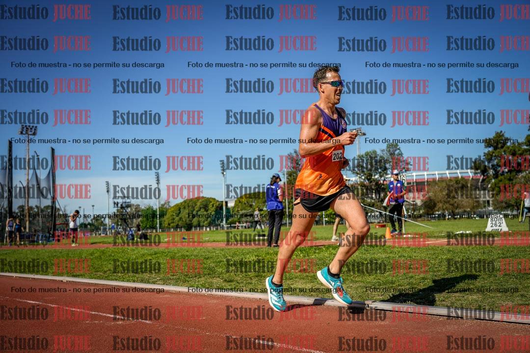 Fotos de los 5000 m llanos de mujeres y varones