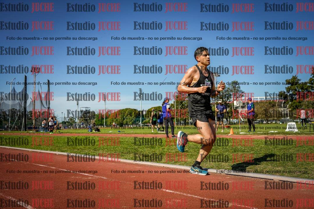 Fotos de los 5000 m llanos de mujeres y varones