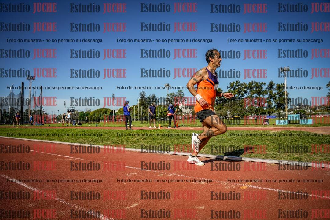 Fotos de los 5000 m llanos de mujeres y varones