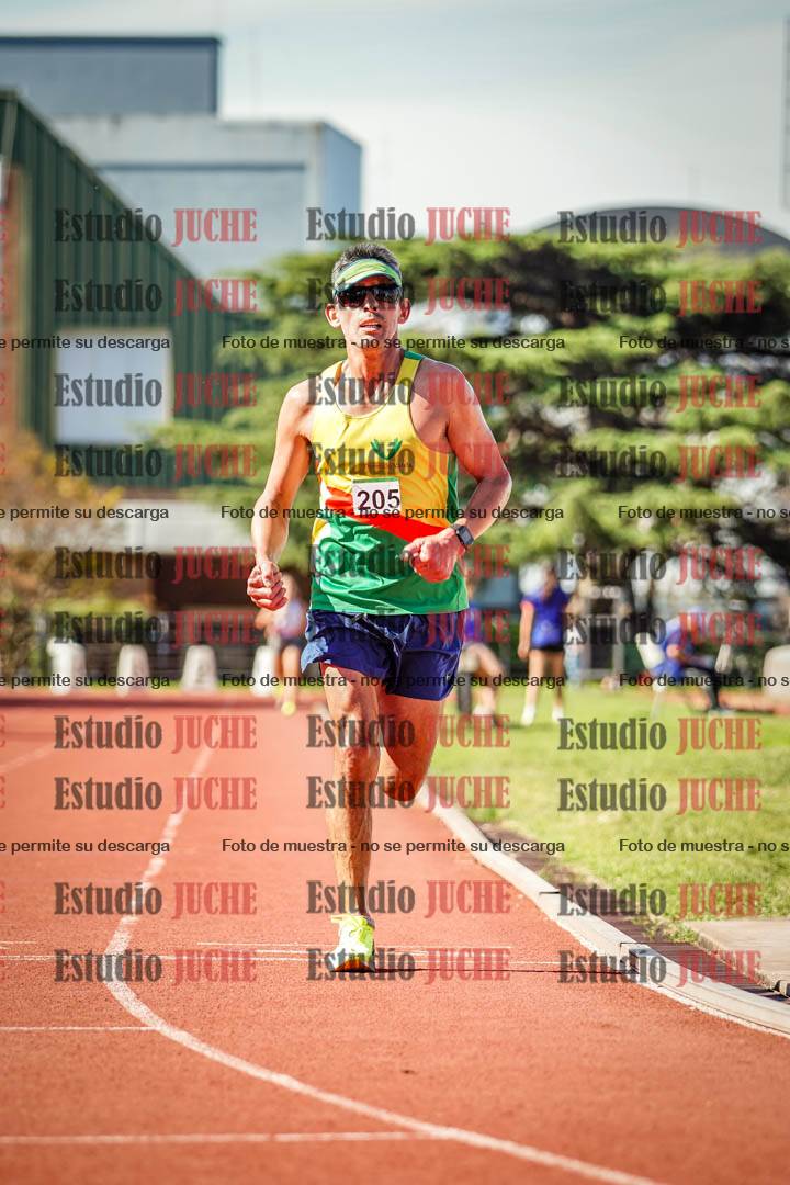 Fotos de los 5000 m llanos de mujeres y varones