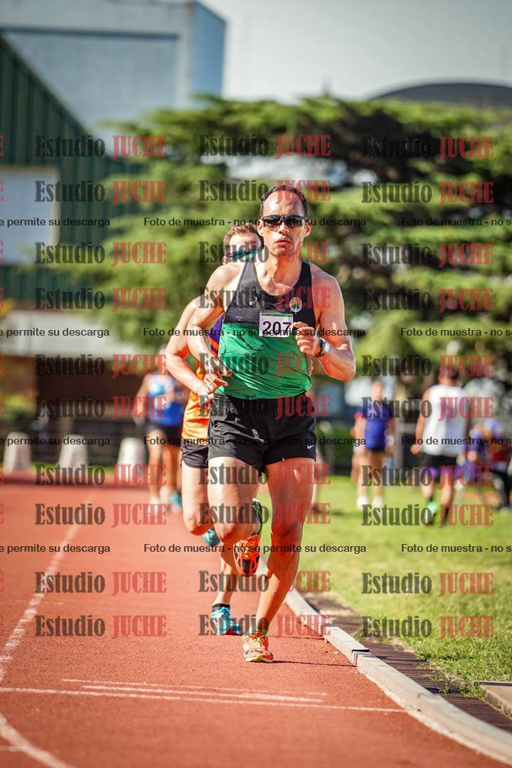 Fotos de los 5000 m llanos de mujeres y varones