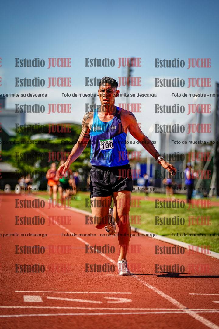 Fotos de los 5000 m llanos de mujeres y varones