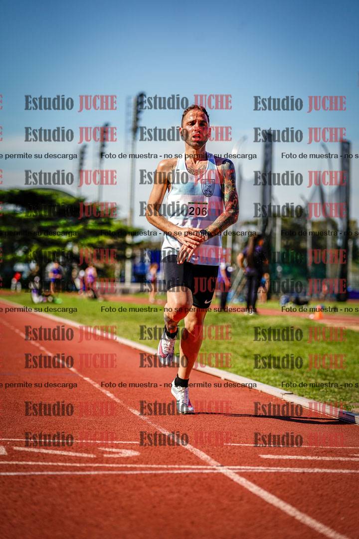 Fotos de los 5000 m llanos de mujeres y varones