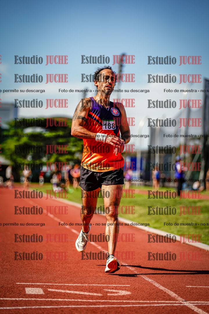 Fotos de los 5000 m llanos de mujeres y varones
