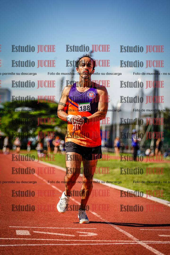 Fotos de los 5000 m llanos de mujeres y varones