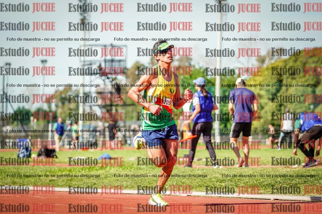 Fotos de los 5000 m llanos de mujeres y varones