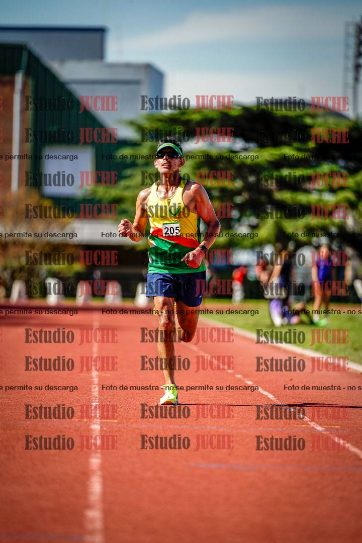 Fotos de los 5000 m llanos de mujeres y varones