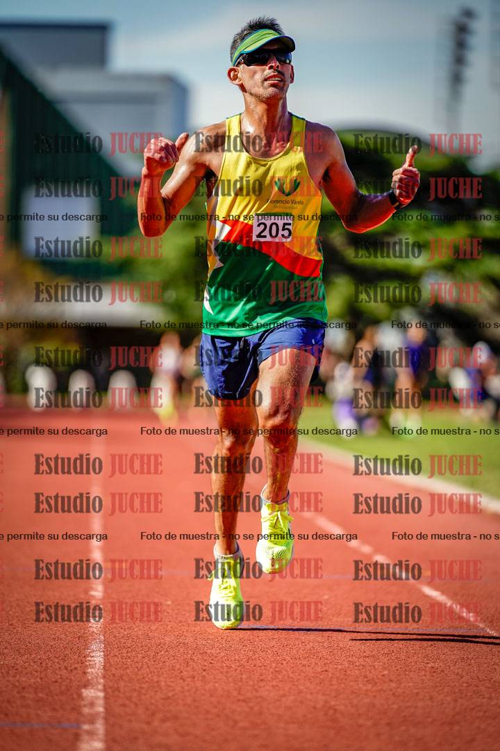 Fotos de los 5000 m llanos de mujeres y varones