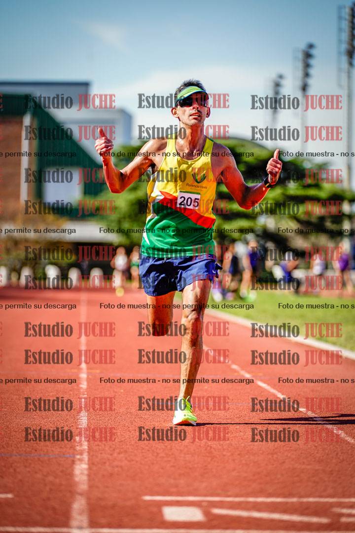 Fotos de los 5000 m llanos de mujeres y varones
