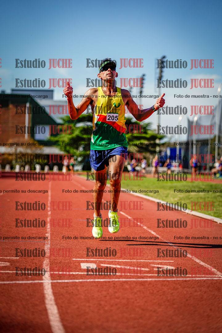 Fotos de los 5000 m llanos de mujeres y varones