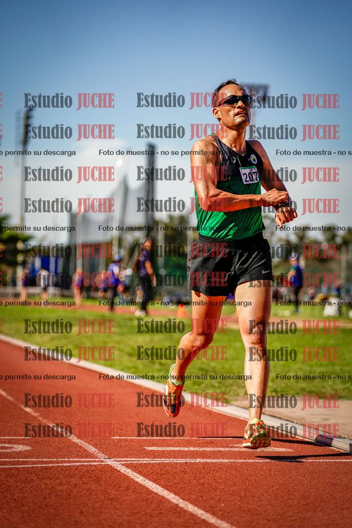 Fotos de los 5000 m llanos de mujeres y varones