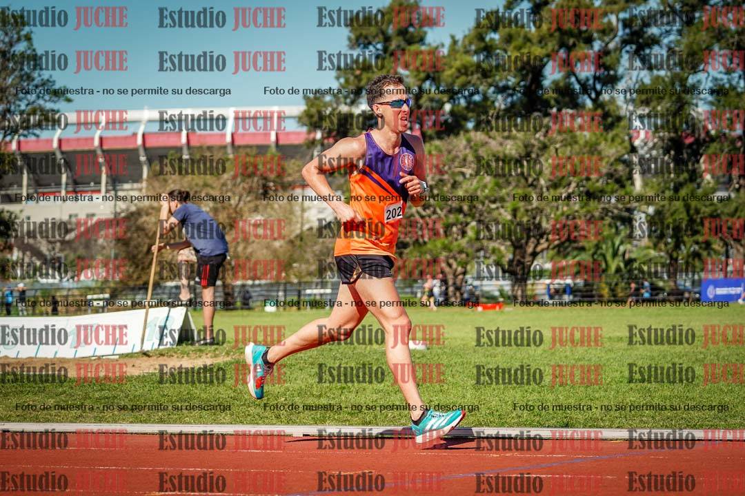 Fotos de los 5000 m llanos de mujeres y varones