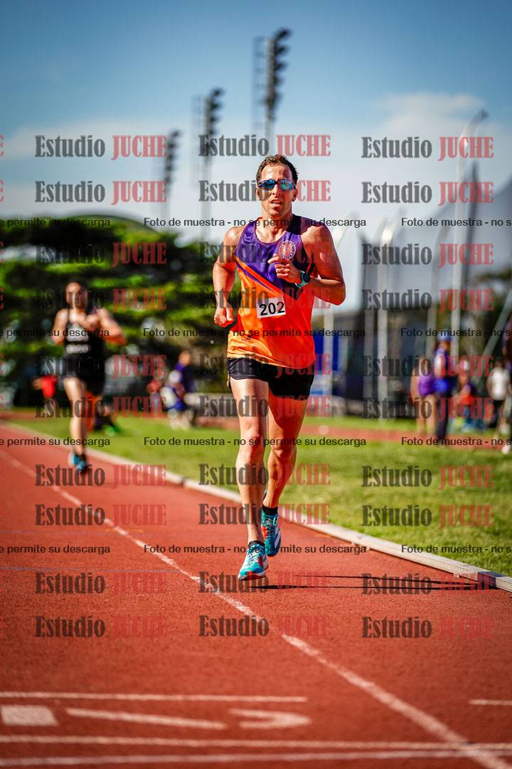 Fotos de los 5000 m llanos de mujeres y varones