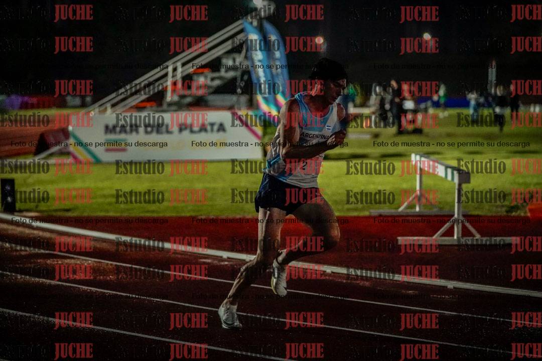 Fotos de los 400 m llanos de varones - deca 5 - serie 1