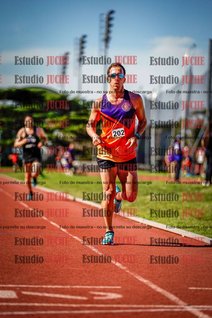 Fotos de los 5000 m llanos de mujeres y varones