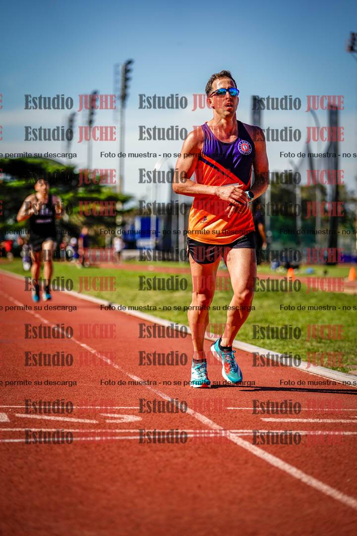 Fotos de los 5000 m llanos de mujeres y varones