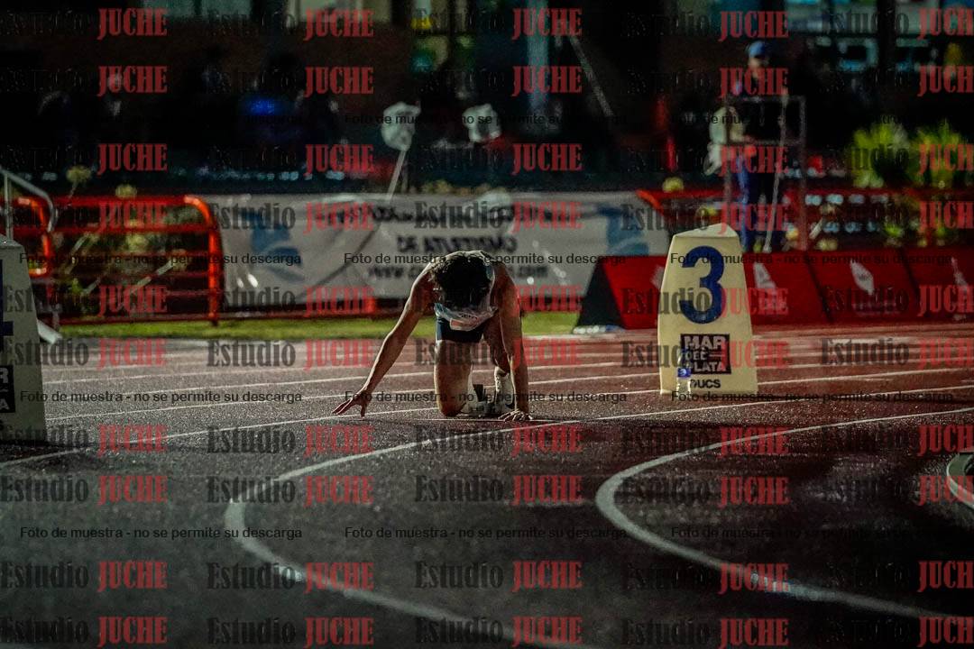 Fotos de los 400 m llanos de varones - deca 5 - serie 1
