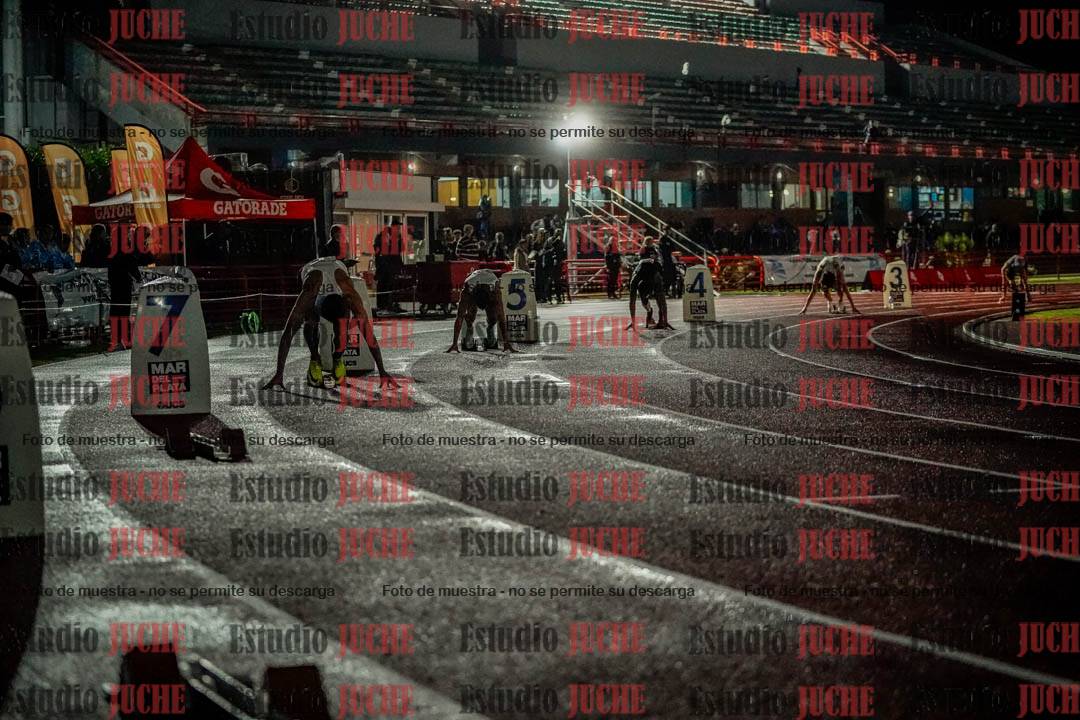 Fotos de los 400 m llanos de varones - deca 5 - serie 1