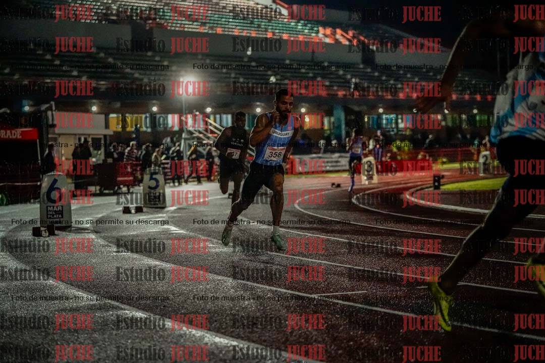 Fotos de los 400 m llanos de varones - deca 5 - serie 1