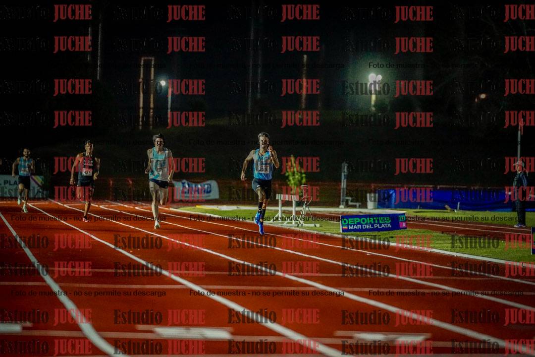 Fotos de los 400 m llanos de varones - deca 5 - serie 1