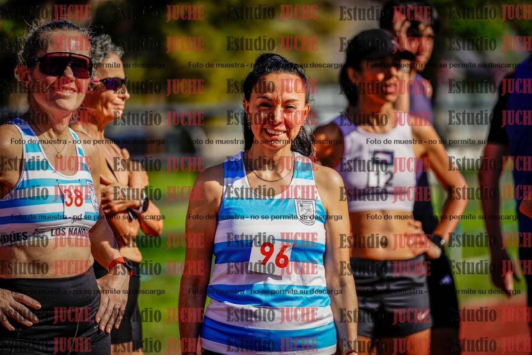 Fotos de los 5000 m llanos de mujeres y varones