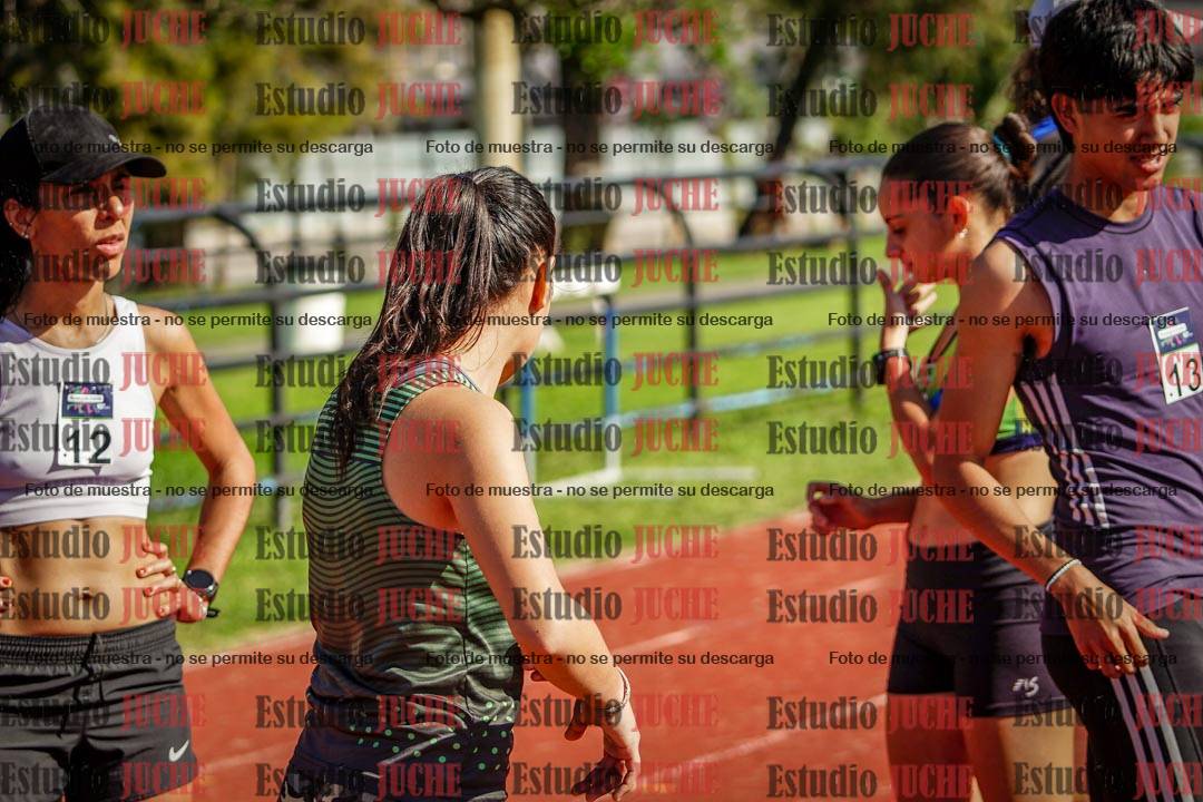Fotos de los 5000 m llanos de mujeres y varones