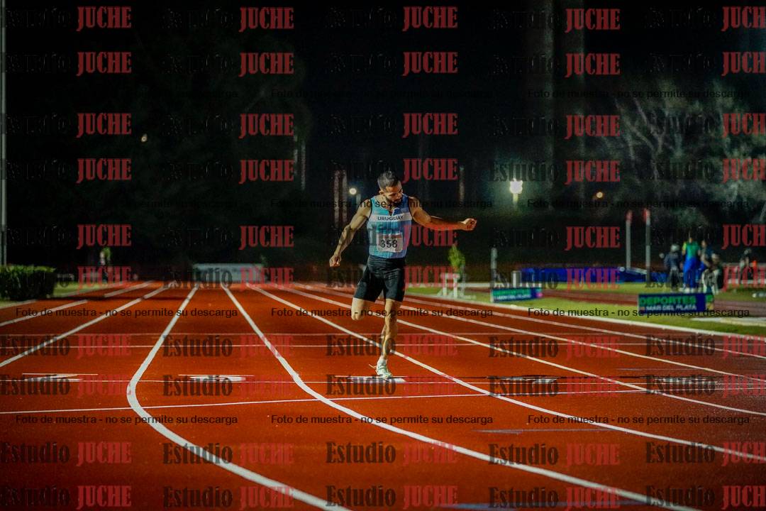Fotos de los 400 m llanos de varones - deca 5 - serie 1