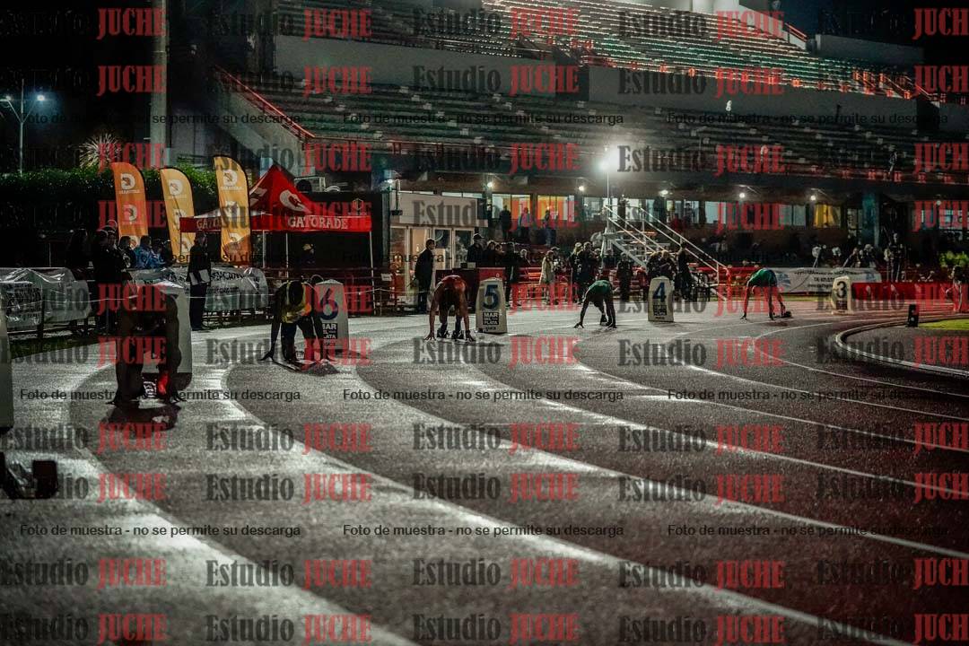 Fotos de los 400 m llanos de varones - deca 5 - serie 2