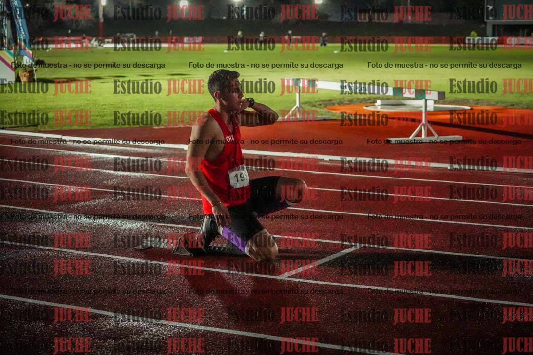 Fotos de los 400 m llanos de varones - deca 5 - serie 2
