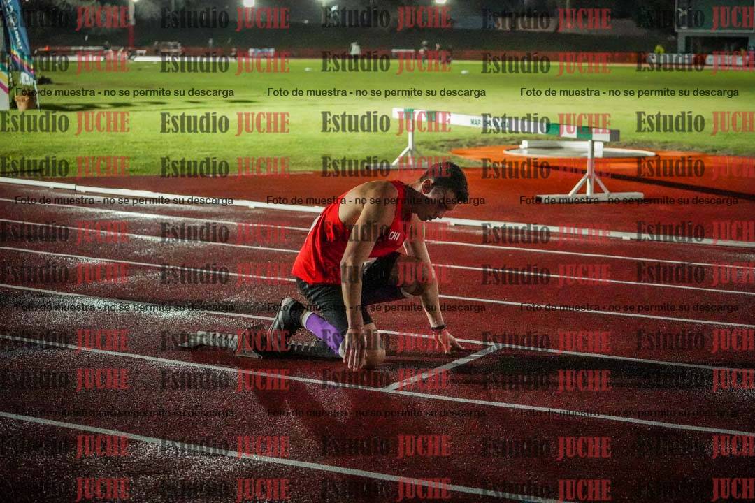 Fotos de los 400 m llanos de varones - deca 5 - serie 2