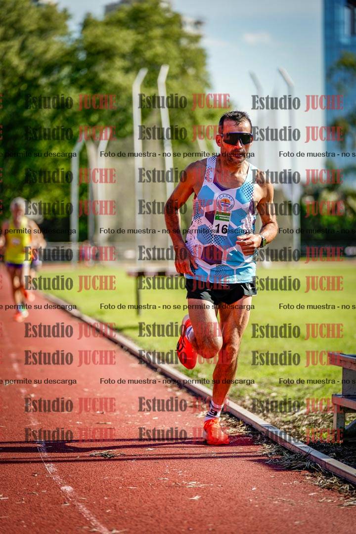 Fotos de los 5000 m llanos de mujeres y varones