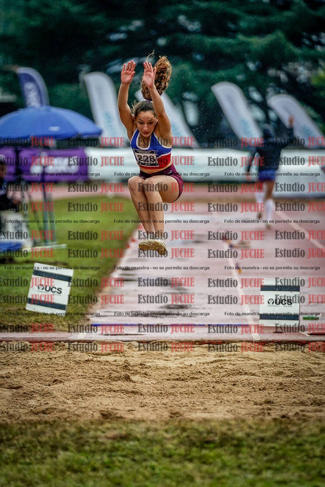 Fotos del salto en largo de mujeres