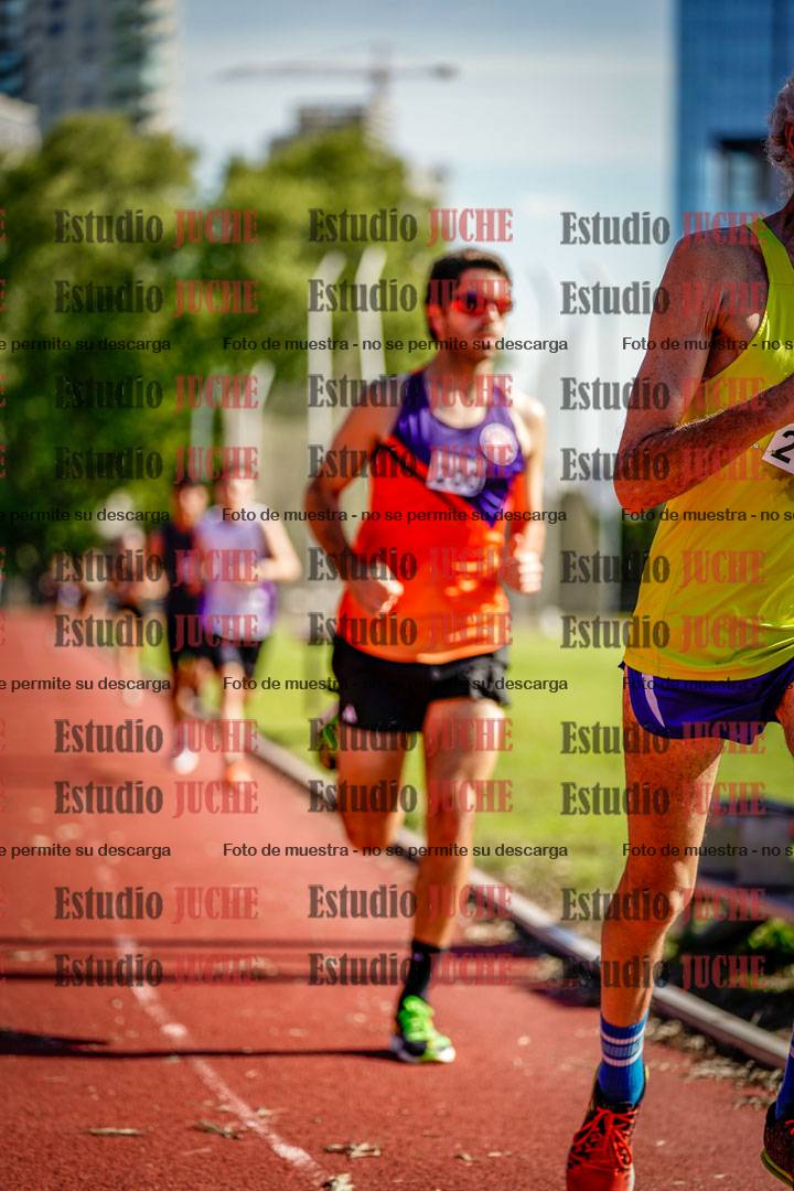 Fotos de los 5000 m llanos de mujeres y varones