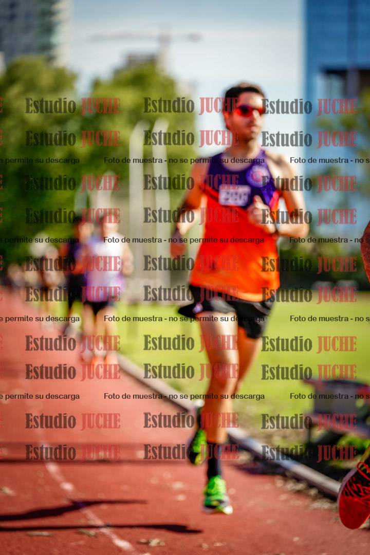 Fotos de los 5000 m llanos de mujeres y varones