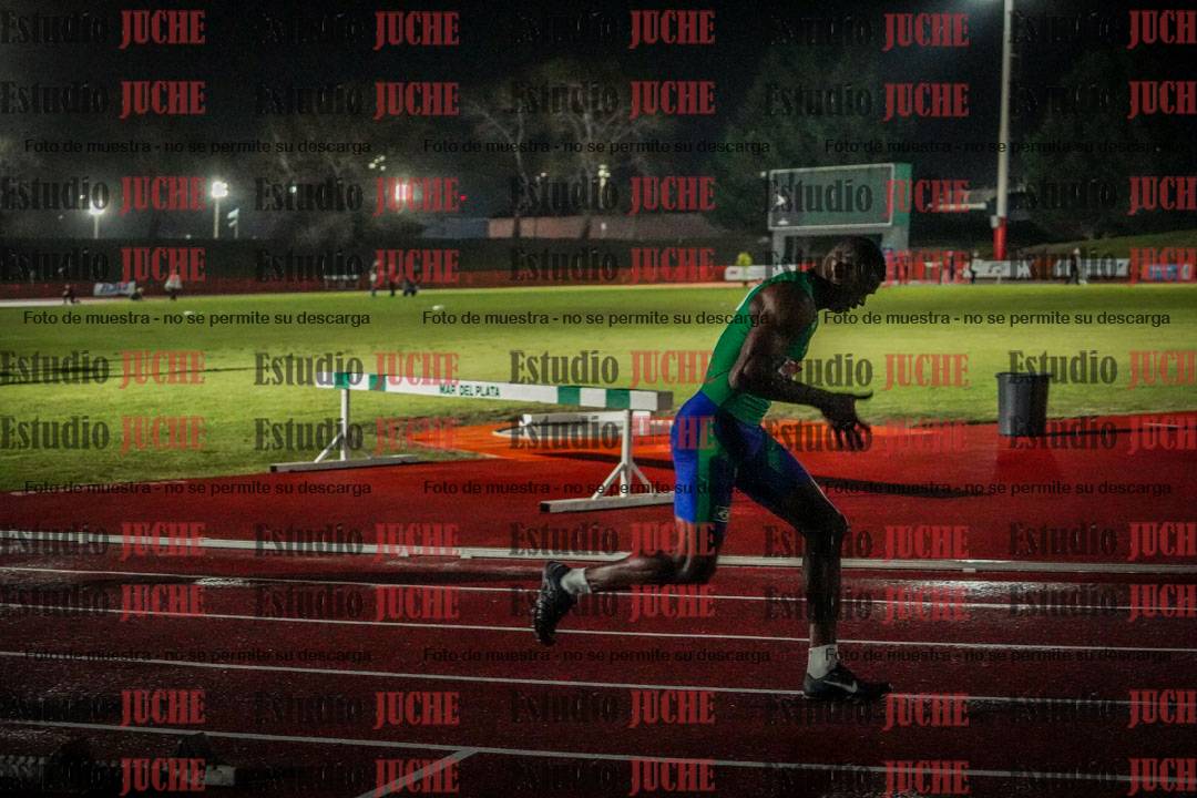 Fotos de los 400 m llanos de varones - deca 5 - serie 2