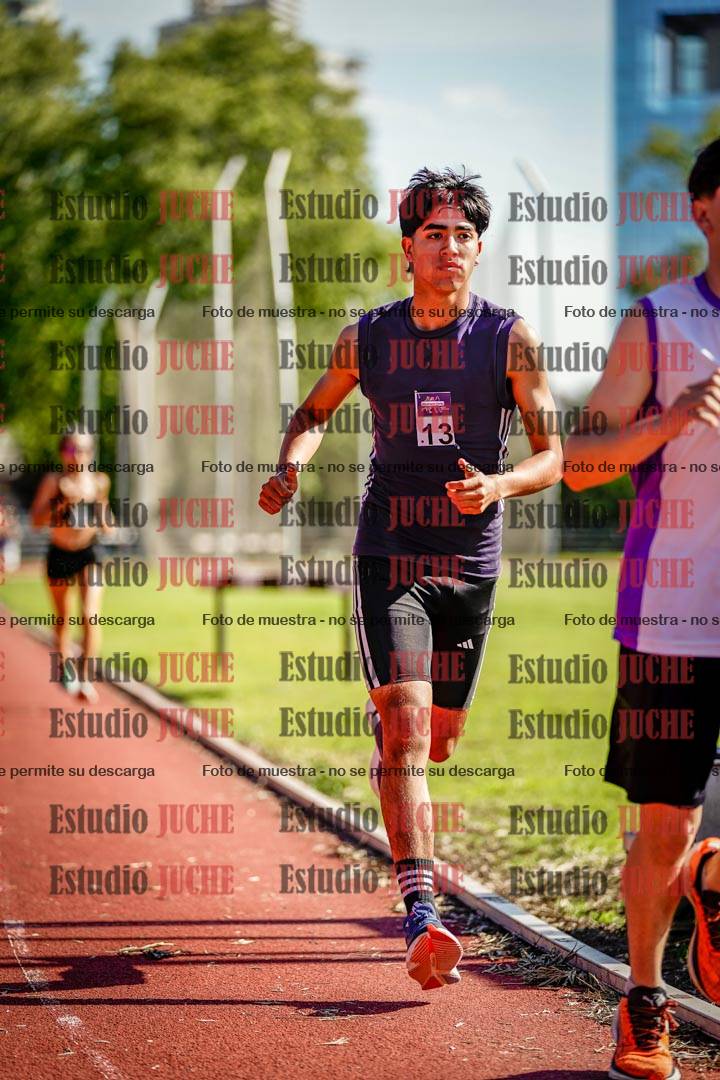 Fotos de los 5000 m llanos de mujeres y varones