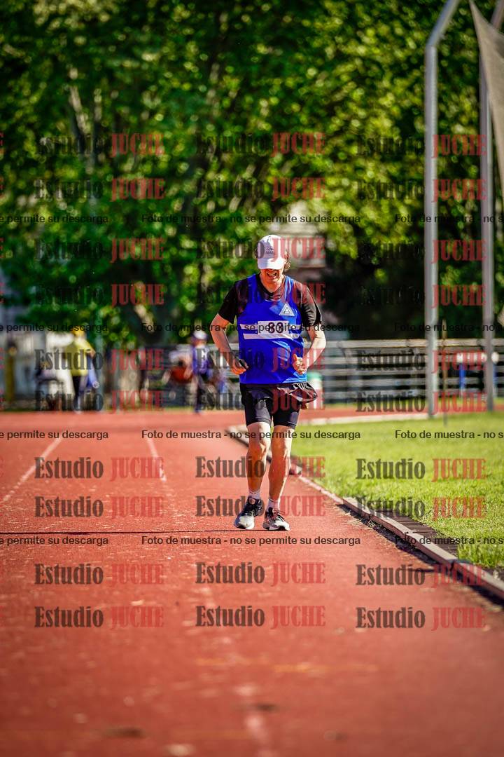 Fotos de los 5000 m llanos de mujeres y varones