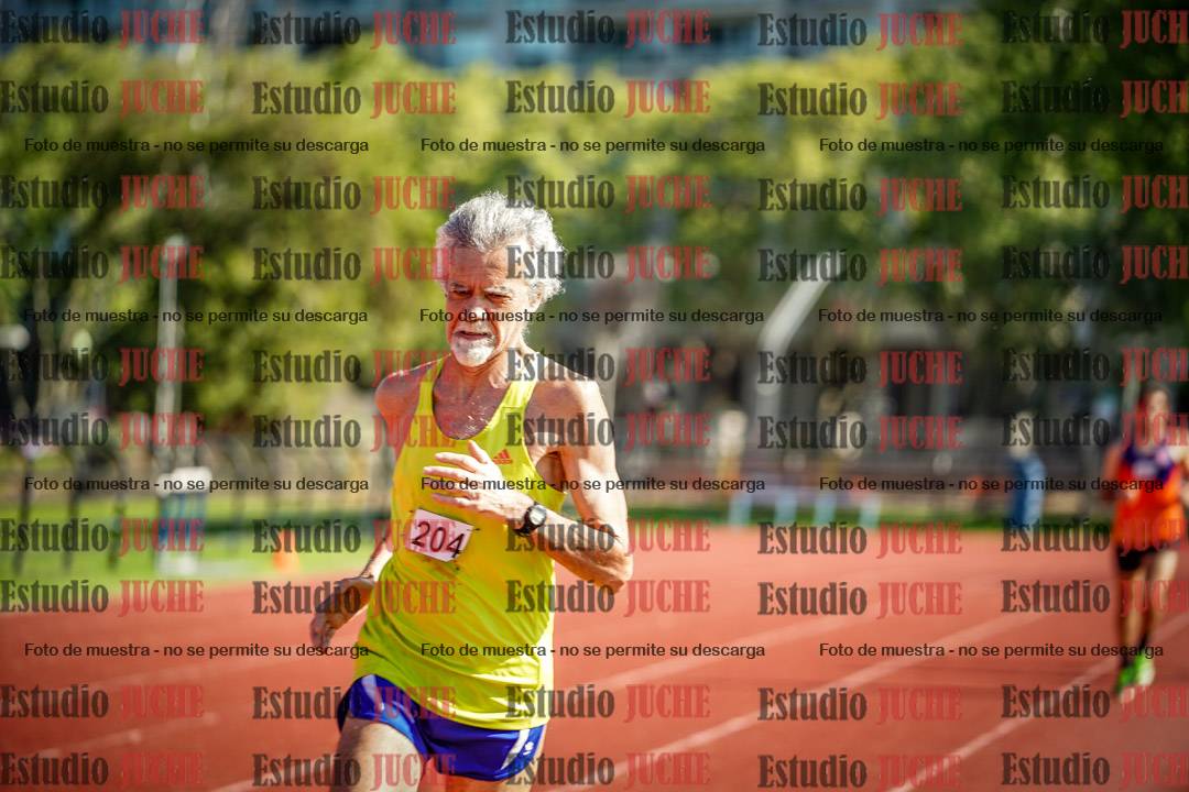 Fotos de los 5000 m llanos de mujeres y varones