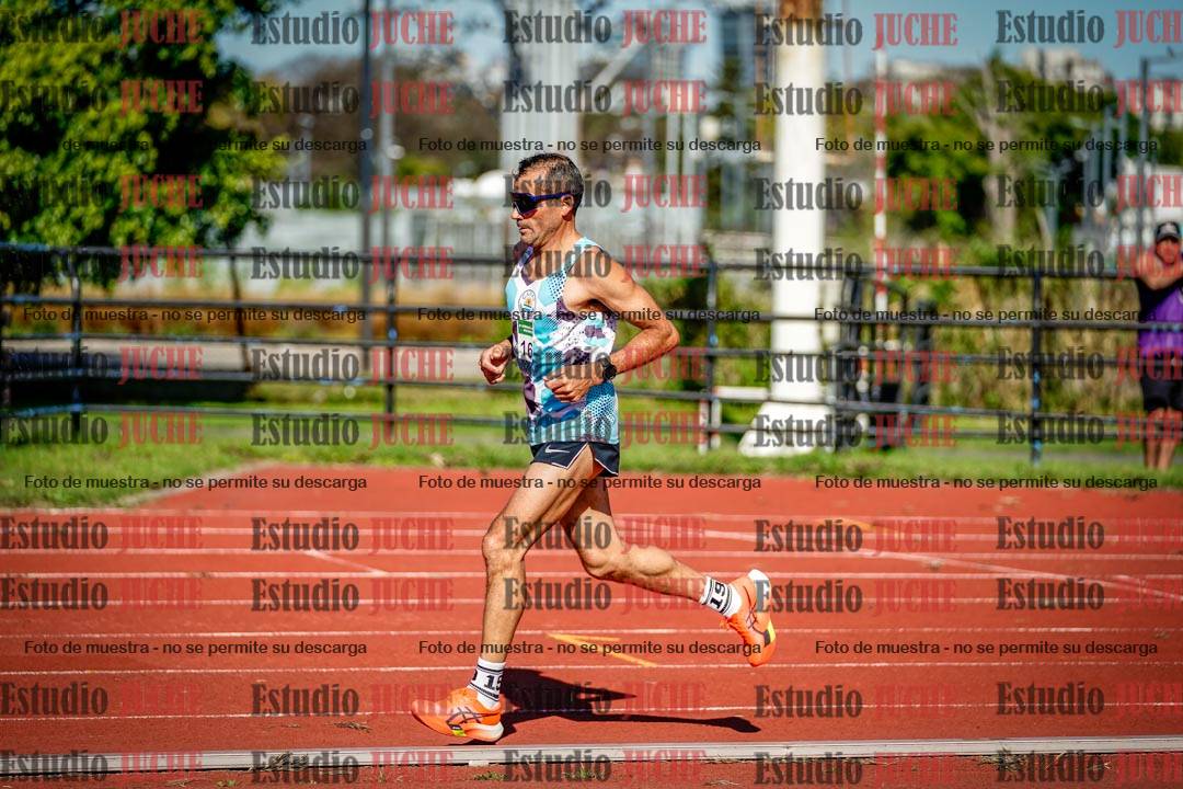 Fotos de los 5000 m llanos de mujeres y varones