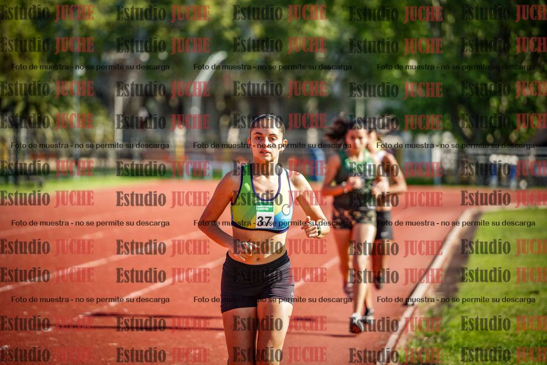 Fotos de los 5000 m llanos de mujeres y varones