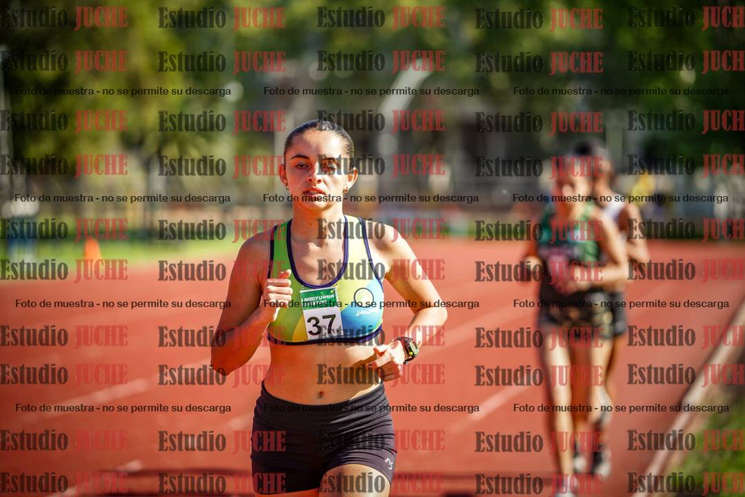 Fotos de los 5000 m llanos de mujeres y varones