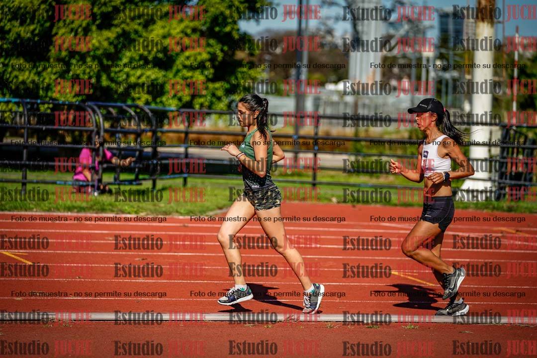 Fotos de los 5000 m llanos de mujeres y varones