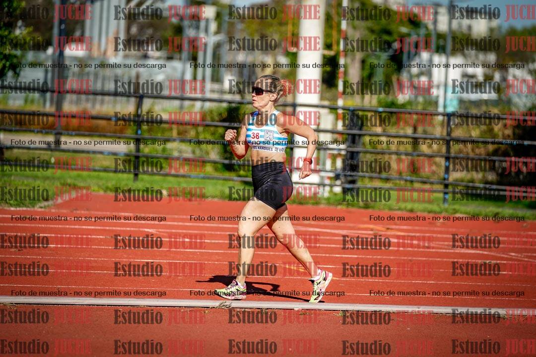 Fotos de los 5000 m llanos de mujeres y varones