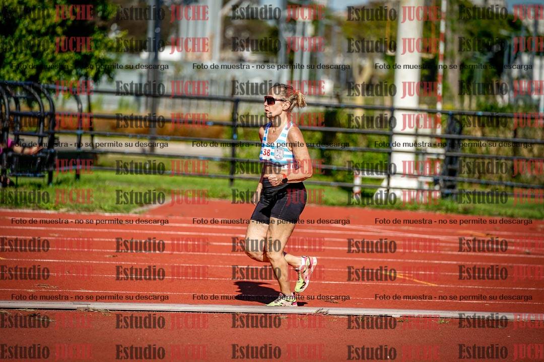 Fotos de los 5000 m llanos de mujeres y varones