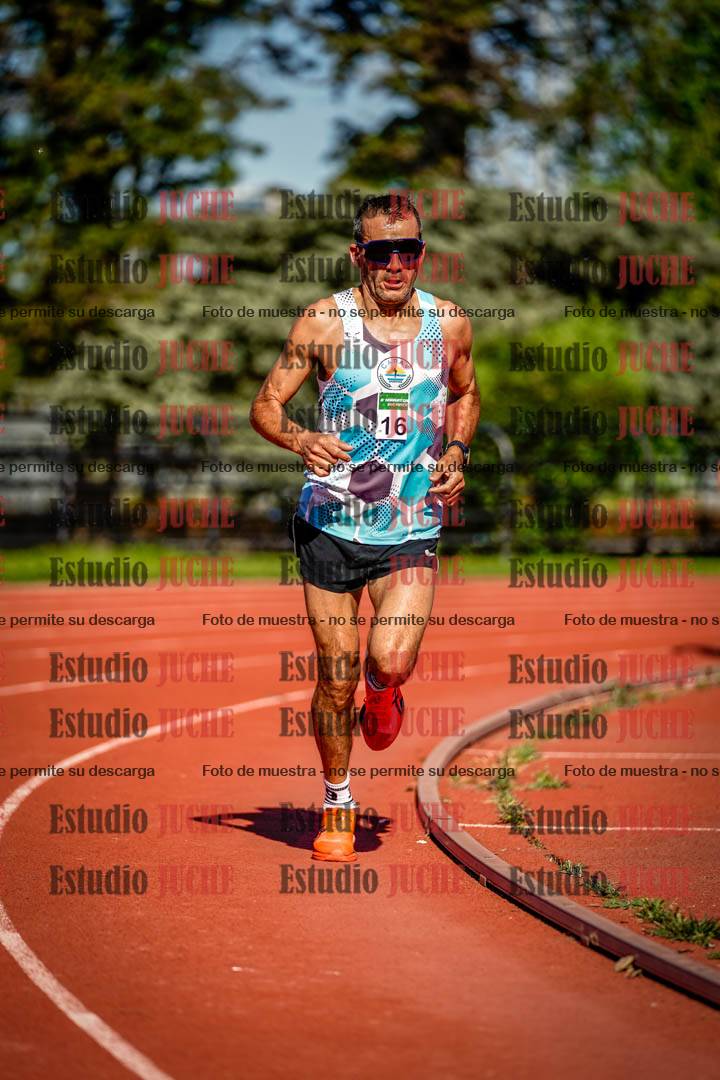Fotos de los 5000 m llanos de mujeres y varones