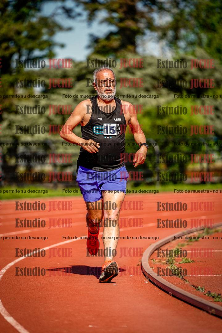 Fotos de los 5000 m llanos de mujeres y varones