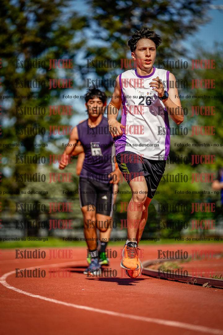 Fotos de los 5000 m llanos de mujeres y varones