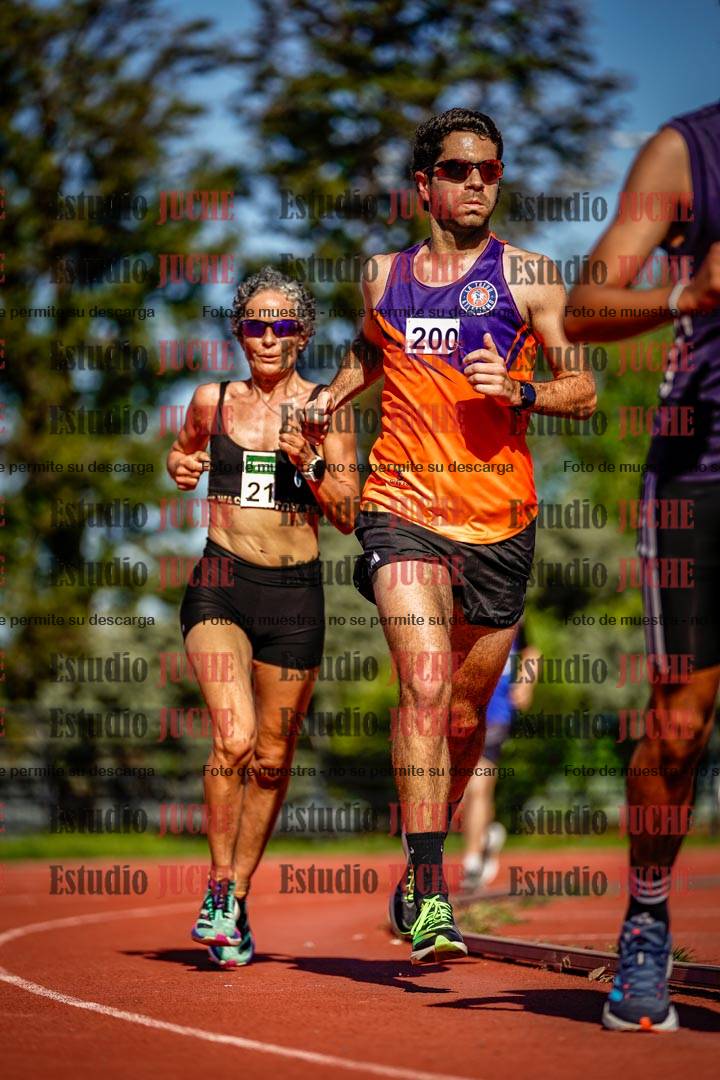 Fotos de los 5000 m llanos de mujeres y varones
