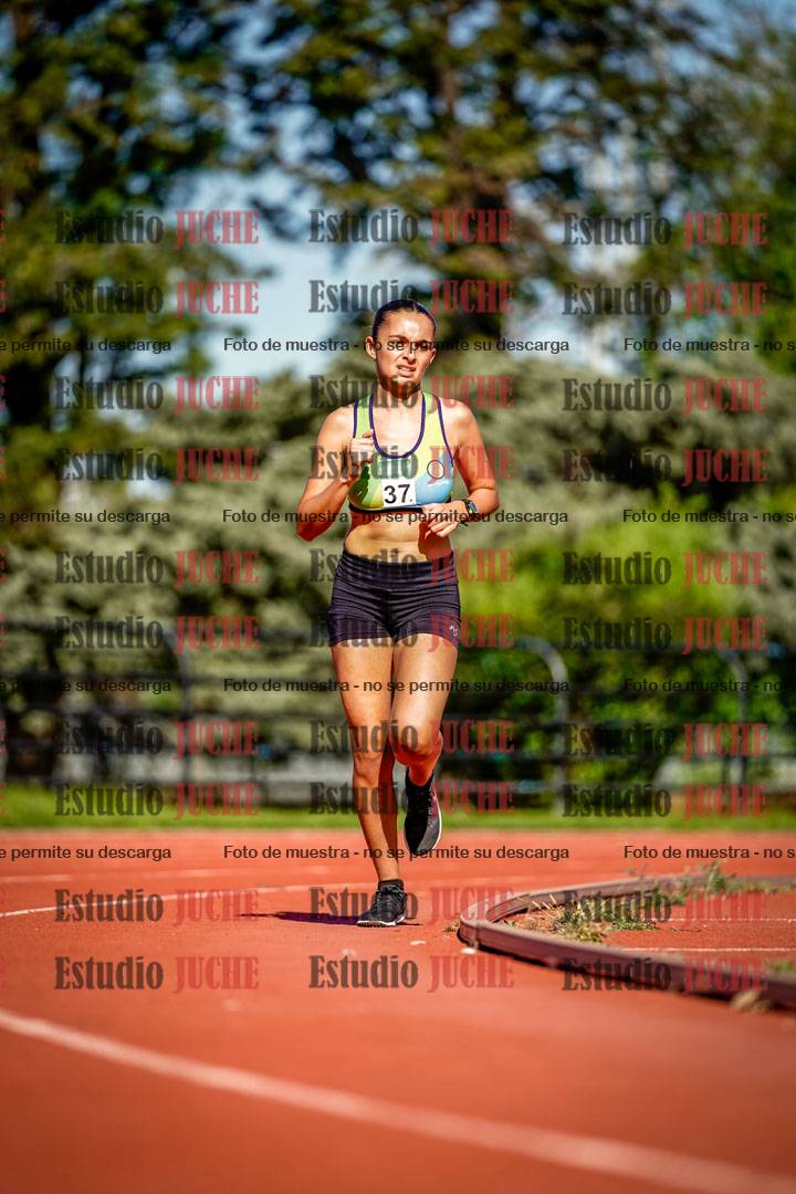 Fotos de los 5000 m llanos de mujeres y varones